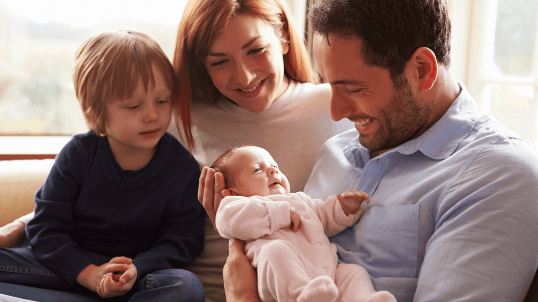 small family with newborn