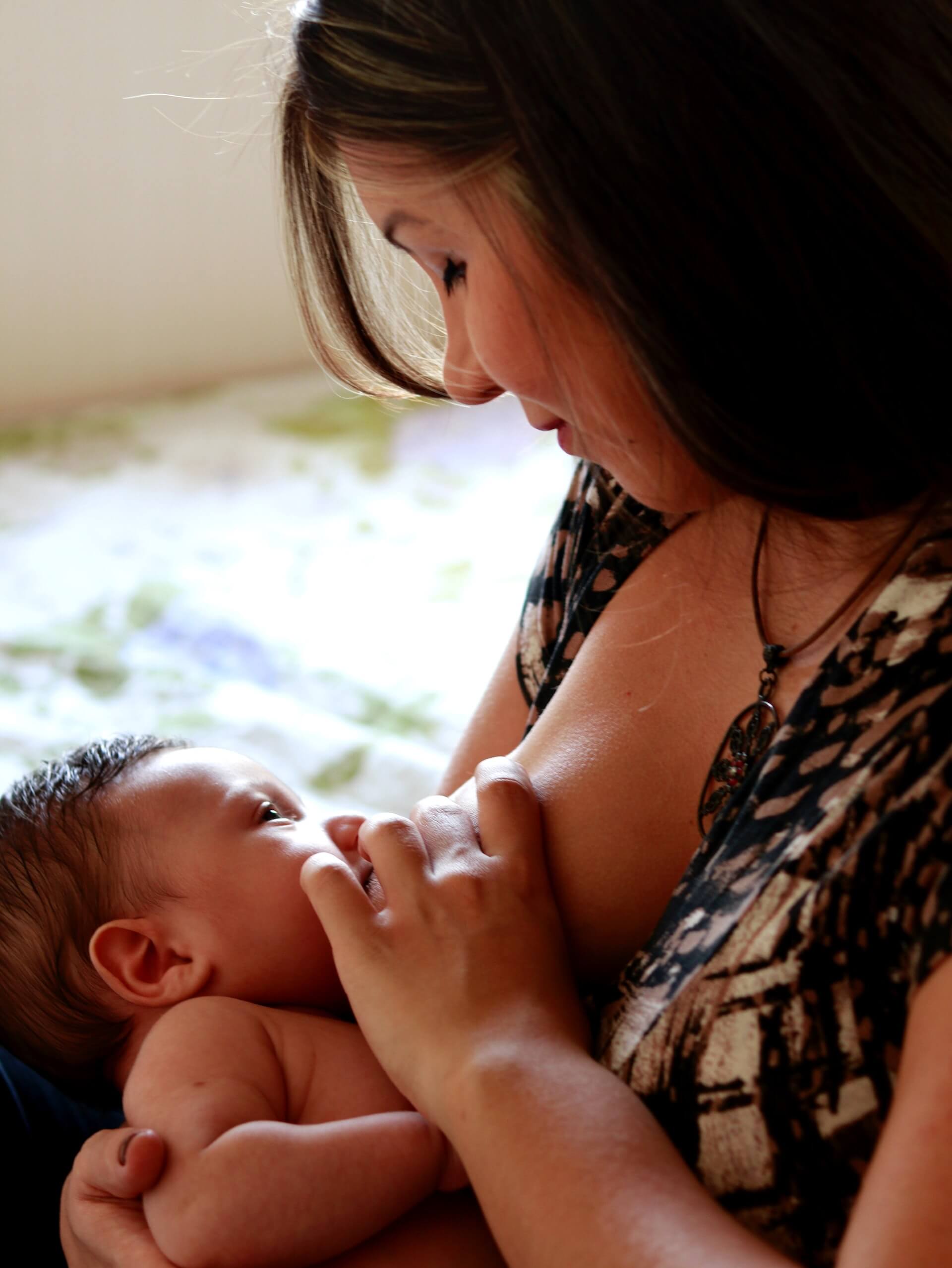 Breastfeeding positions women feeding newborn Vector Image